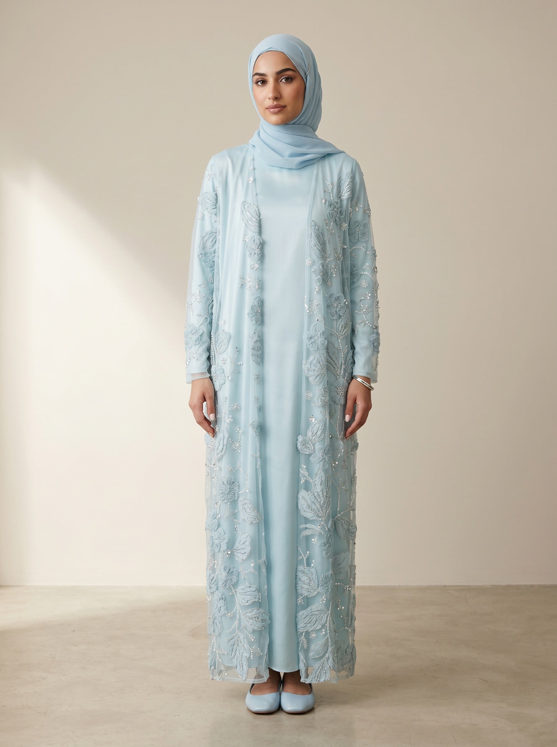 Bloom Collection Floral Abaya Ice Blue - front view on model